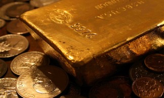 Gold Bar with Reflected Coins - Bullion Vault