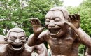 "Amazing Laughter" sculpture by Yue Minjun - Matthew Grapengieser