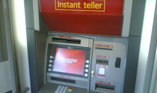 Waiting in Line for the ATM at Broadway Station - Roland Tanglao