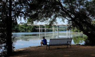 Solitude by the lake with a hint of motorway - Lars Plougmann