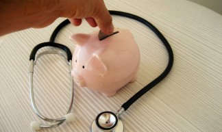 Stethoscope and piggy Bank - 401(K) 2012
