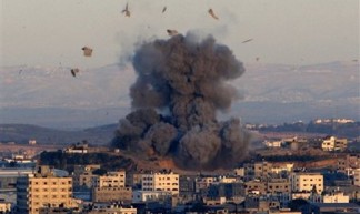 an Israeli bomb explodes in Gaza - Jim Forest