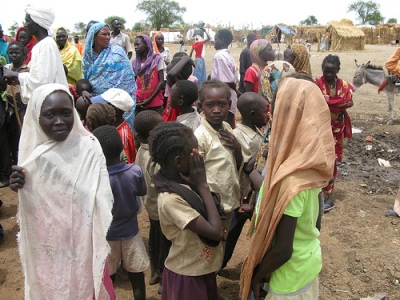 cc Flickr UK Department for International Development Children queue for water in the Jamam refugee camp
