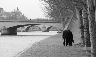 Old couple walking along the Seine - Daniel Racovitan