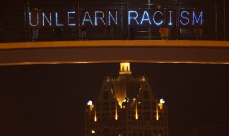 Unlearn Racism 11 - Light Brigading