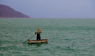 Man, Phone and the Sea - Peter Morgan
