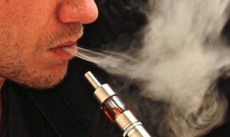 Vaping an Electronic Cigarette / Smoking an E Cig - Ecig Click