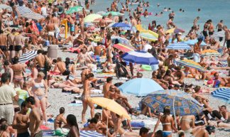 crowded beach - mark notari